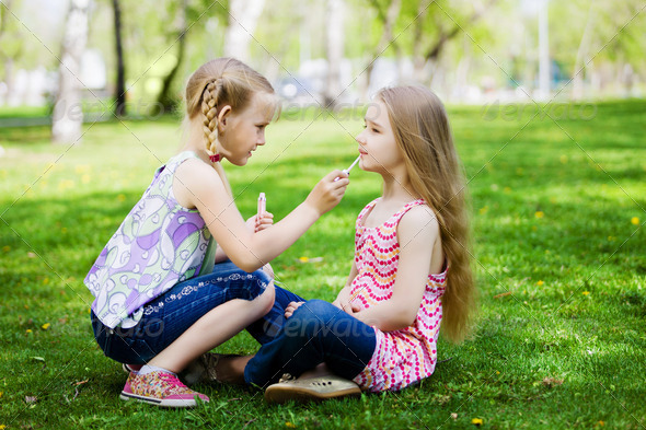 Little girls in park - Stock Photo - Images