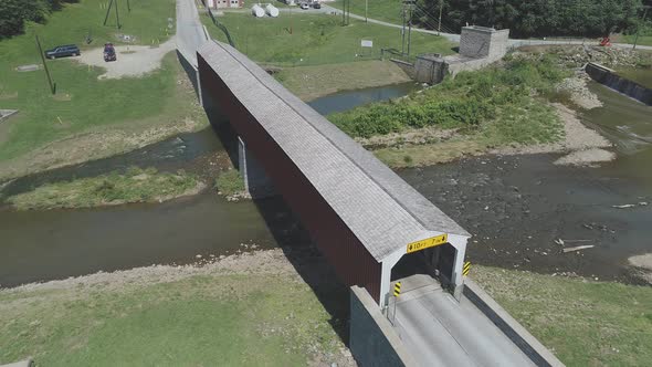 Aerial View of a Covered Bridge in Pennsylvania Countryside alt
