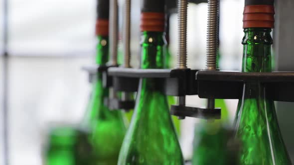 Beer Production. Conveyor Line With Bottles At Brewery Closeup alt