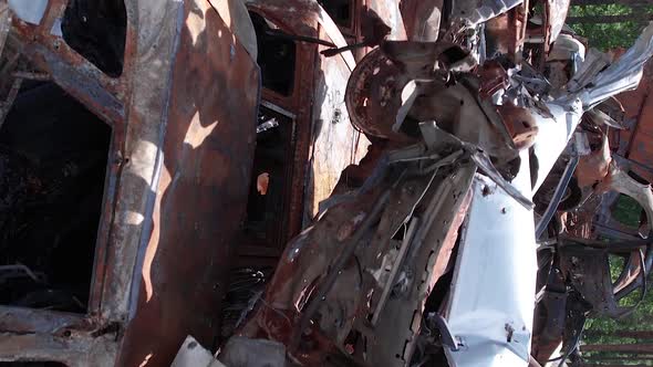 Vertical Video of Wardestroyed Cars in Ukraine alt
