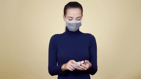 Woman Spraying Hands with Disinfectant, Clean Hands, Coronavirus Protection alt