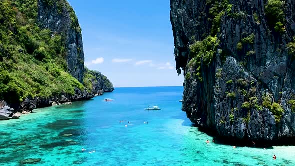 Aerial reveal of shimizu and Inatula island. El Nido, Palawan, Philippines alt