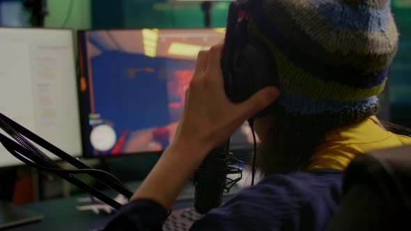 Closeup of Streamer Wearing Professional Gaming Headphones alt