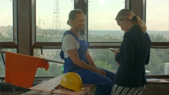 Funky and Successful Engineer Dancing and Having Fun with Designer While Listening Music alt