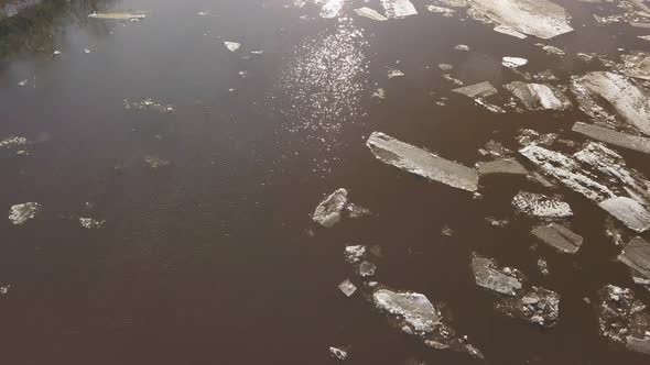 The Ice Floes Floating on the River. The Ice Drift in Spring Time