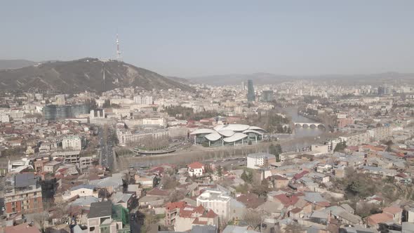 Tbilisi, Georgia - October 25 2021: Flying over Baratashvili bridge in the center of Tbilisi alt