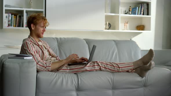 Freelancer Talking Home Online Resting in Pajamas alt