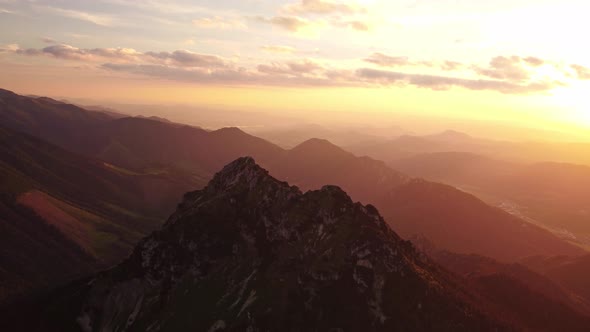 Beautiful Morning Mountain Landscape in the Glow of the Rising Sun Aerial View in