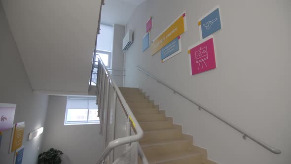 Color Pictures and Motivating Inscriptions on Staircase Wall alt