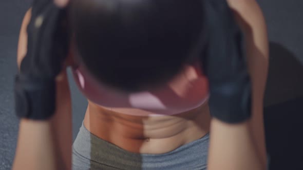 Close up of Asian Athlete fit and firm girl sit-up exercise on floor for abdomen workout in fitness alt