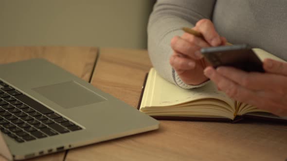 Close Up Wrinkled Male Hands Writing Information alt