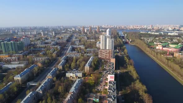 Flying Over Moscow on the Drone. Houses and Buildings Bird's Eye View . Sunny City