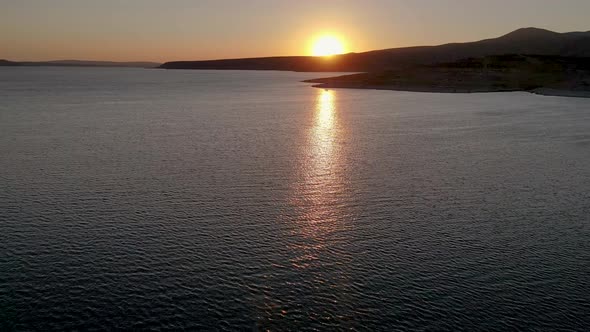 Sunset and Boat on the Sea alt