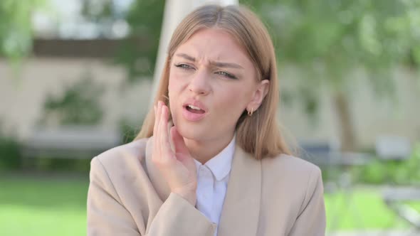 Outdoor Portrait of Young Businesswoman Having Toothache Cavity alt