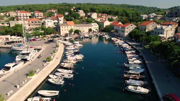 Aerial view of Sumartin harbor with small boats anchored, Brac island, Croatia. alt