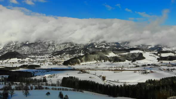 Drone Video of Mountains in Winter in Austria  alt