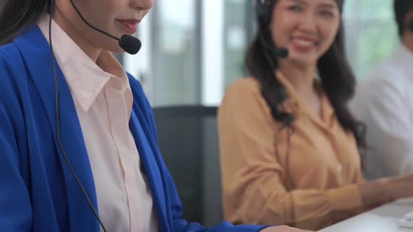 Business People Wearing Headset Working Actively in Office alt