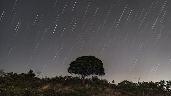 Timelapse shot of Ma On Shan, countryside of East Hong Kong, Asia, Hong Kong at night with star trai alt
