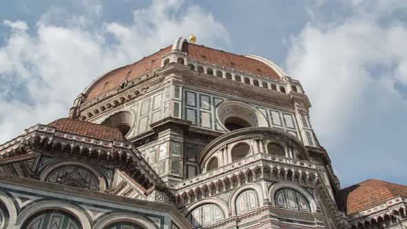 Timelapse of clouds over a cathedral dome alt