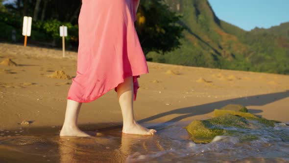 Slow Motion Woman Feet Walking Barefoot By Beach at Sunset Leaving Footprints alt