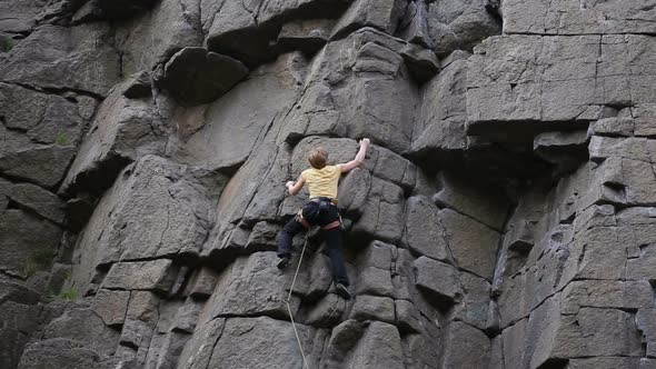 Rock Climber Reaches Top