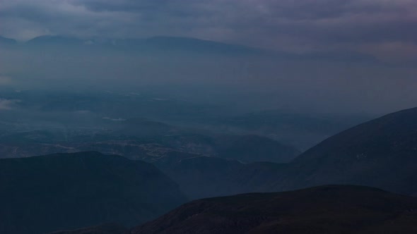 Quito, Ecuador, Timelapse - The mountains of Quito and the valleys during a cloudy sunrise