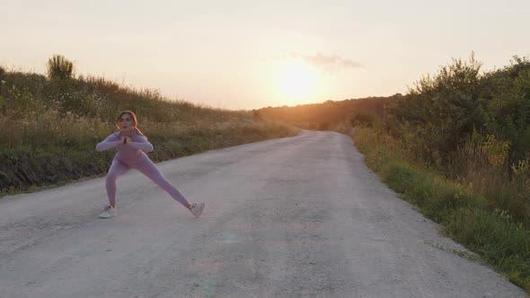 Slow Motion of a Young Girl That Makes Stretching alt