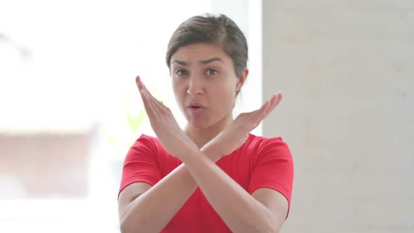 Portrait of Rejecting Indian Woman Waving Hand alt