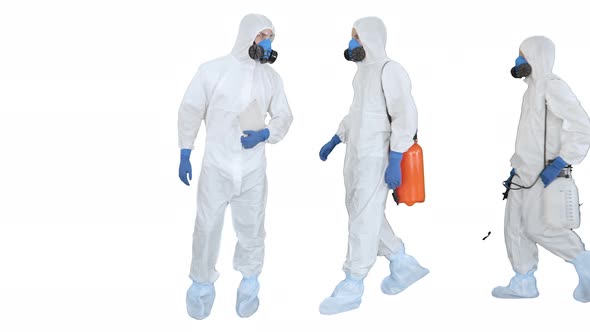 Three Disinfectors Walk in Holding the Disinfectant in Their Hands on White Background alt