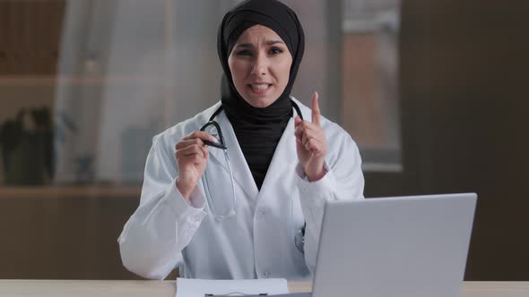 Muslim Annoyed Woman Head Doctor Specialist Indignantly Shouting at Camera Aggressive Having Own alt