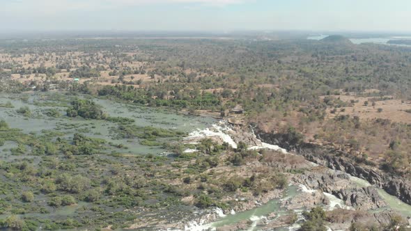Aerial: flying over Don Det and the 4000 islands Mekong River in Laos alt
