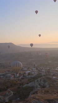 Vertical Video of Hot Air Balloons Flying in the Sky Over Cappadocia Turkey alt