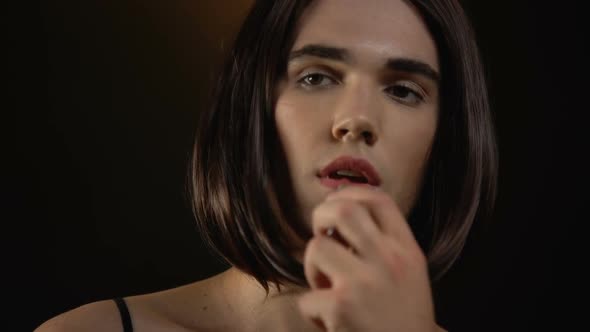 Attractive Male Transgender Putting on Makeup Before Cabaret Show, Gay Fashion alt