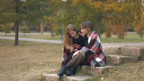 Two Girls in Autumn Park