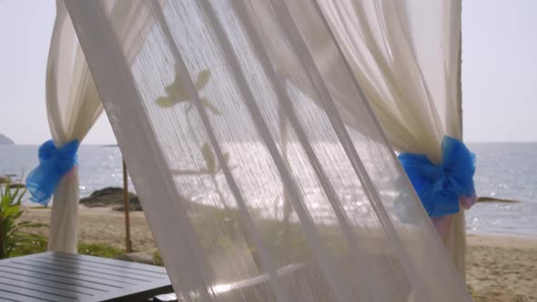 Romantic Canopy Blowing and Waving by Wind at The Beach alt
