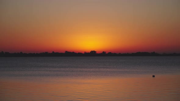 Orange blue sunset lake
