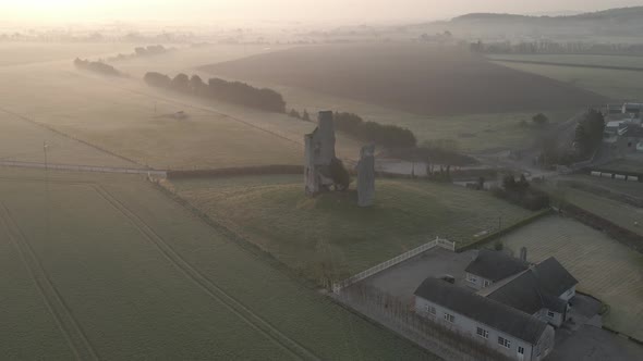 Misty Landscape Over Morett Castle Ruins In County Laois, Ireland. Aerial Drone Shot alt