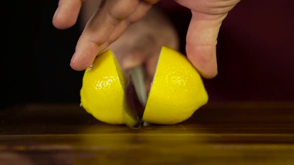 Cutting a Lemon with a Knife 