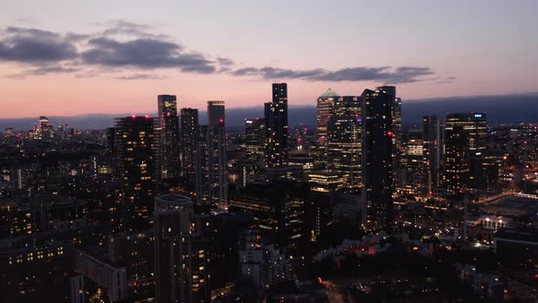 Ascending Footage of Skyscrapers in Canary Wharf Business Centre at Dusk alt