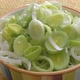 Fresh chopped leek in a ceramic bowl isolated.  - VideoHive Item for Sale