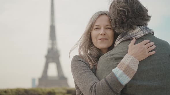 Happy senior couple in Paris. alt