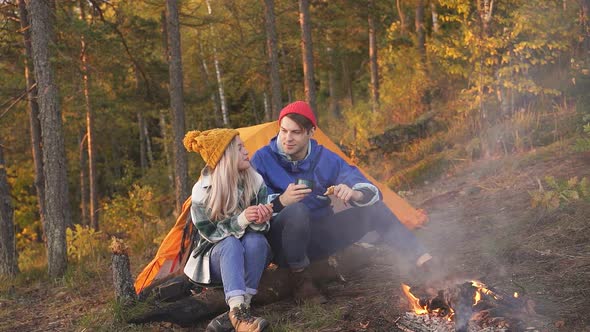 Camping Tent Camp in Nature Happy Caucasian Friends in Autumn at Nature Forest Hike alt