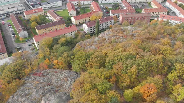 Mountain with Autumn Foliage and Residential Housing Community Aerial
