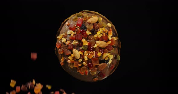 Easter Cake Is Decorated With Icing, Candied Fruit, Nuts And Chocolate alt