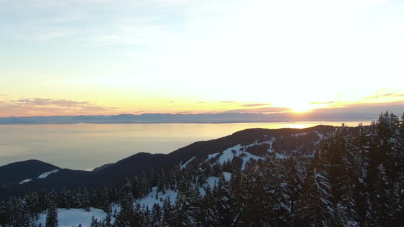 Aerial View of Hollyburn Mountain During Winter Sunset alt