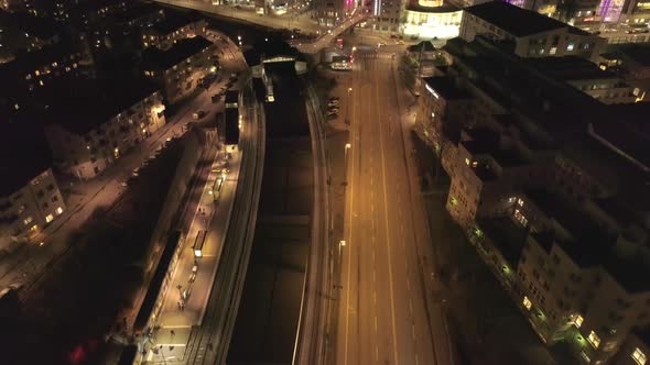 City Street and Train Station at Night Aerial