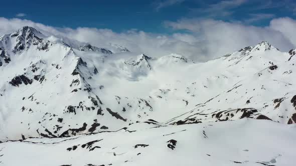 Aerial View from an drone of Beautiful Snowy Caucasus Mountain Landscape in Winter