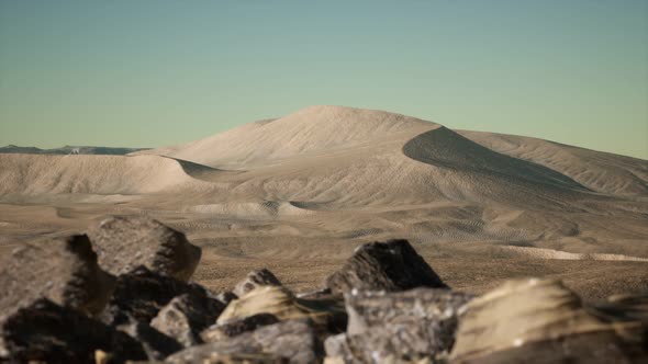 Aerial View on Big Sand Dunes in Sahara Desert at Sunrise alt