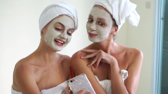 Beautiful Woman Having a Facial Treatment at Spa alt