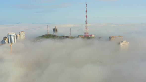 Drone View of the Vladivostok Lowlands Covered in Morning Sea Mist at Dawn alt